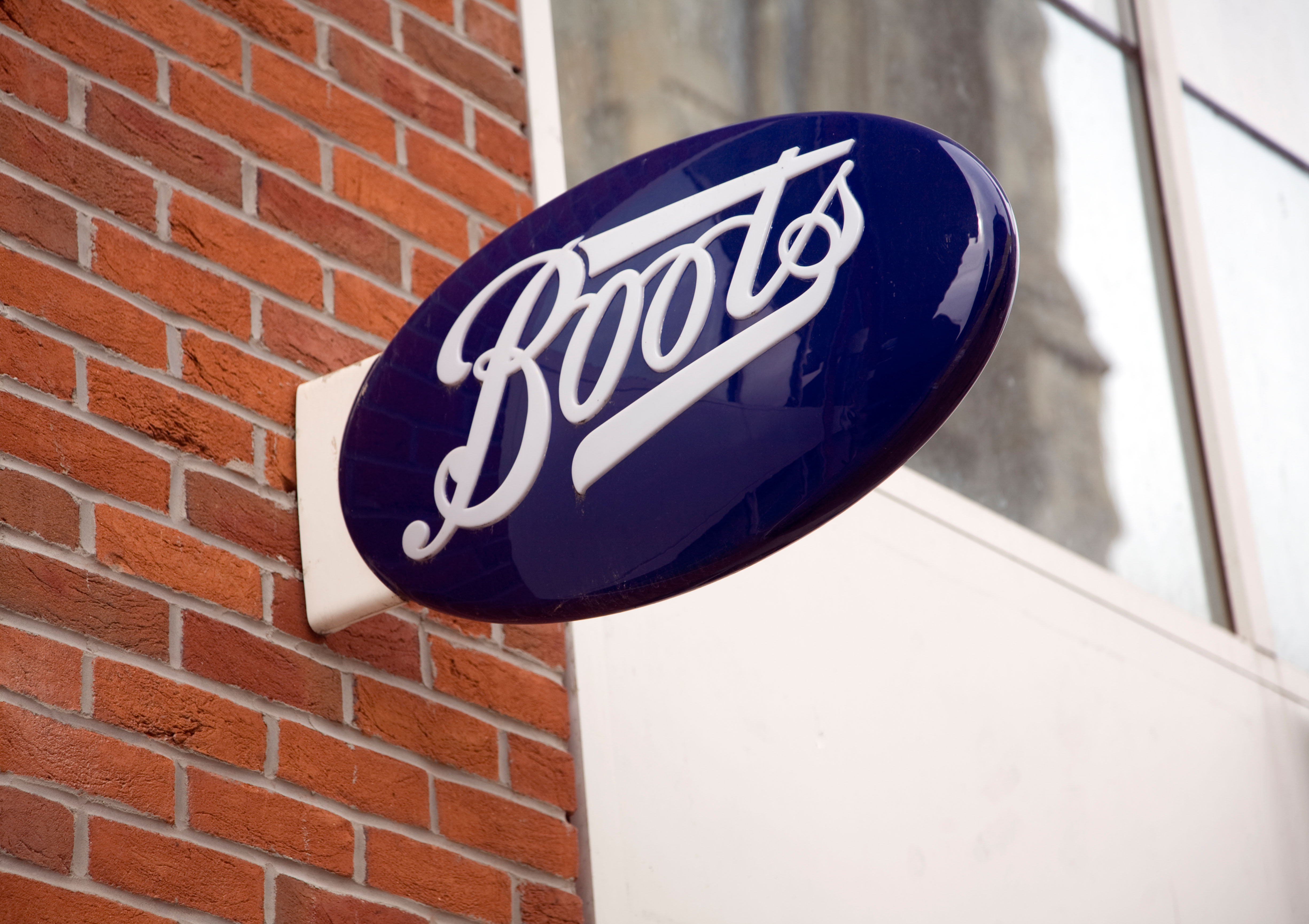 Boots sign on wall